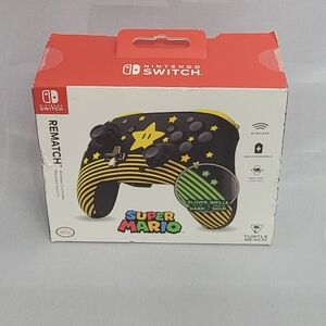Nintendo Switch Super Mario Black and Yellow Controller